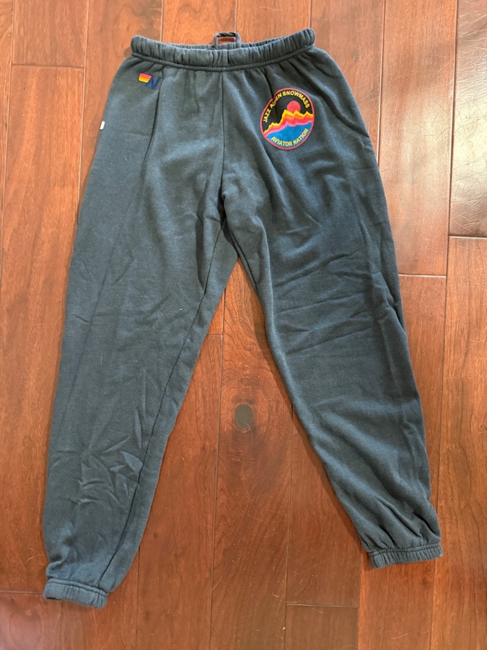Medium Aviator Nation black sweatpants w/ Jazz Aspen Snowmass emblem & pant- leg